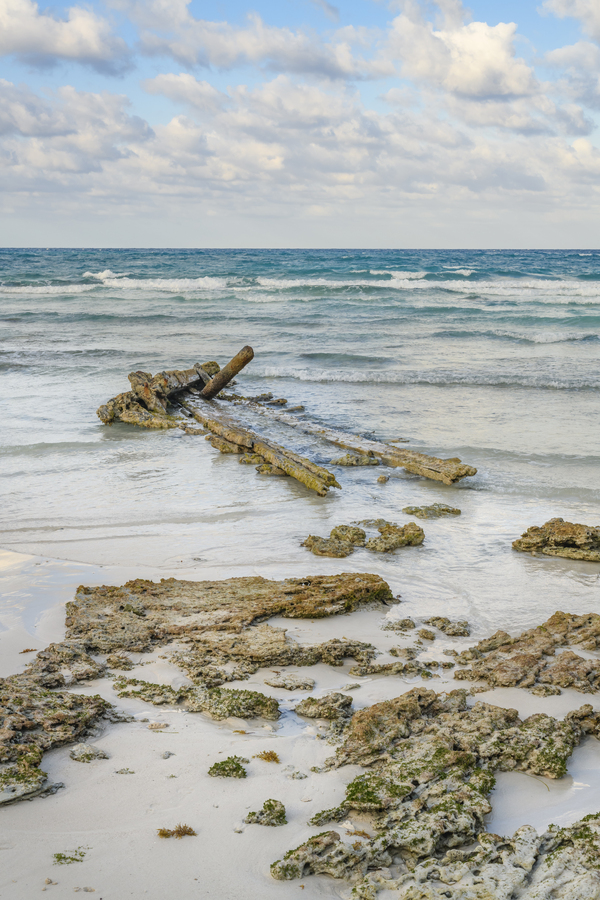 Cuban beach shipwreck Print