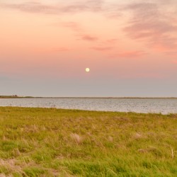 Isle De Madeleine moonrise at sunset