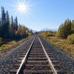 Banff Train tracks with sun 2