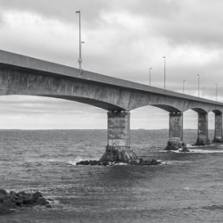 Confederation bridge in black and white wide view PEI