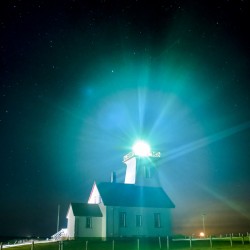 Wood island lighthouse PEI night with moon rise