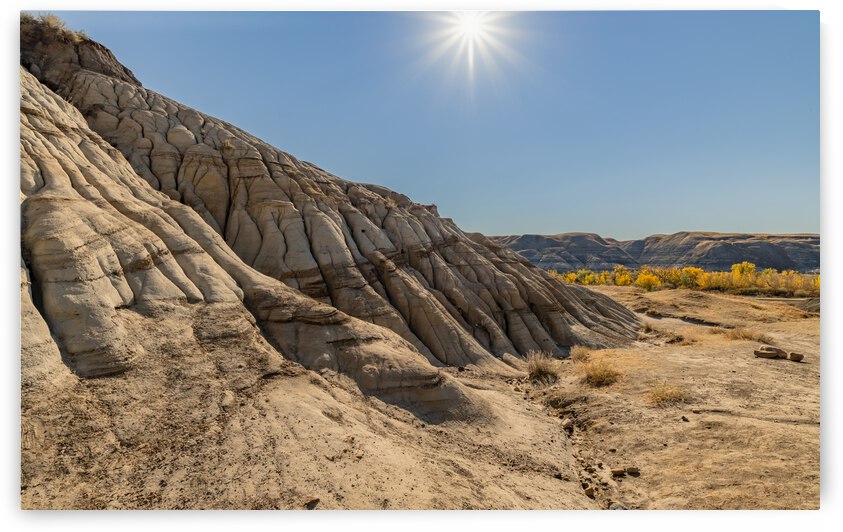 Hoodoos hills with sun by Justin Richard Batten
