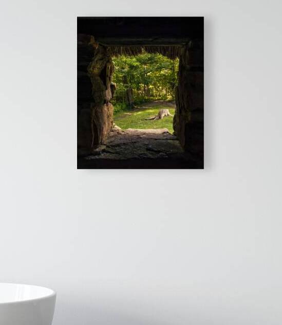 Cuban Pelican flying with blue sky by Justin Richard Batten