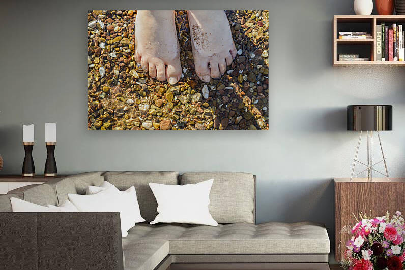 Wading toes in the ocean water by Justin Richard Batten